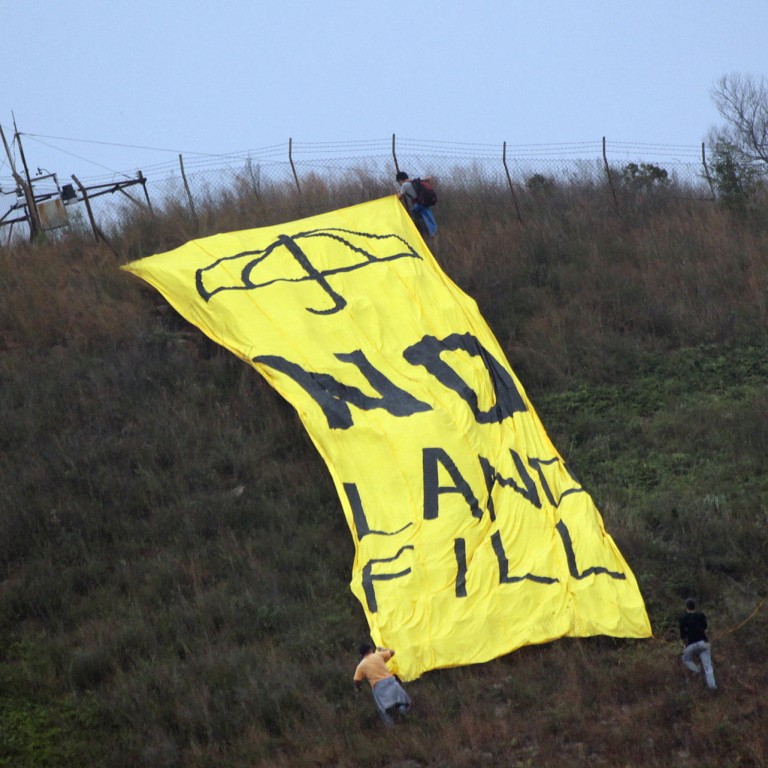 Villagers trash New Territories landfill with banner inspired by Occupy