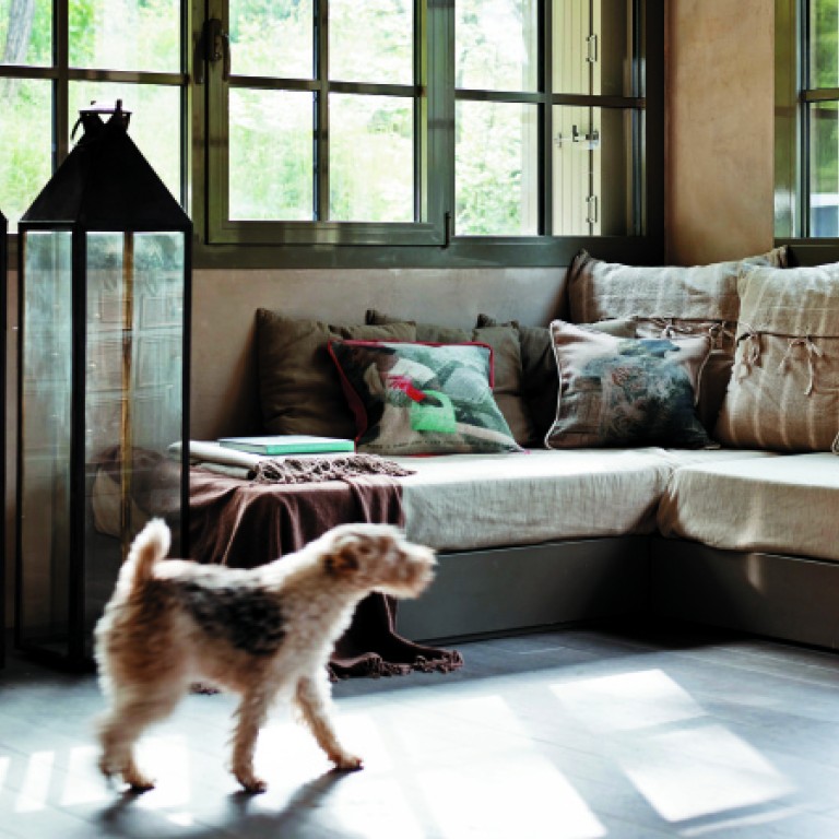 Natural light from the large windows adds to the intimate nature of the home.