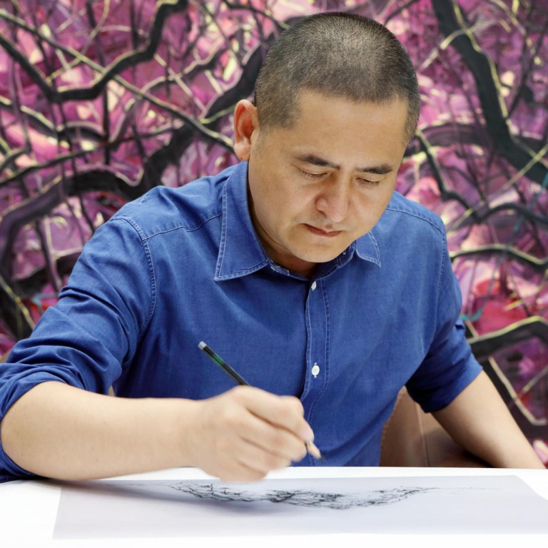 Zeng Fanzhi at work in his studio in Beijing. Zeng says painting to him is meditation. Photos: Zeng Fanzhi Studio