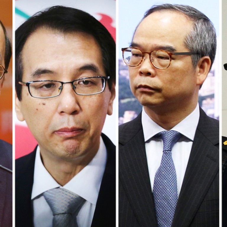 Two Hong Kong government ministers Tsang Taksing and Paul Tang