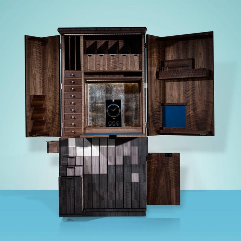There is an Odyss infotainment device which can display the time, photographs, videos or maps. Artfully disguised in the marquetry base are traditionally constructed drawers and a bespoke humidor for cigars.