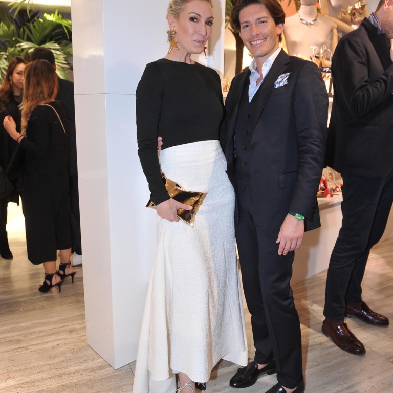 Olivia Buckingham catches up with Edgardo Osorio at the launch party. Buckingham is wearing star earrings to match her shoes from the collaboration #stylescmp