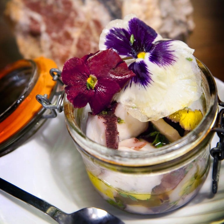 Nightjar serves a marinated octopus salad with special ingredients and flowers.