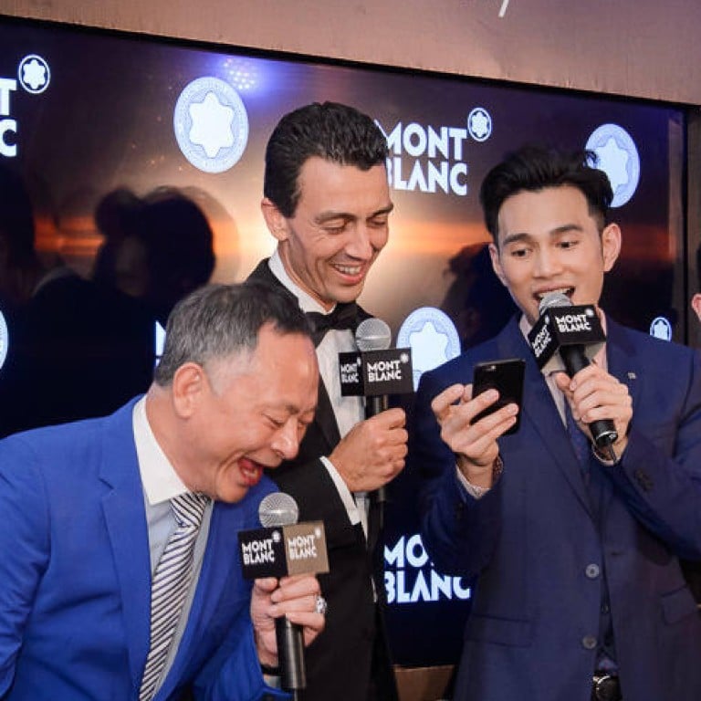 Johnnie To jamming with Julien Renard and Jonathan Wong at the Montblanc soiree.
