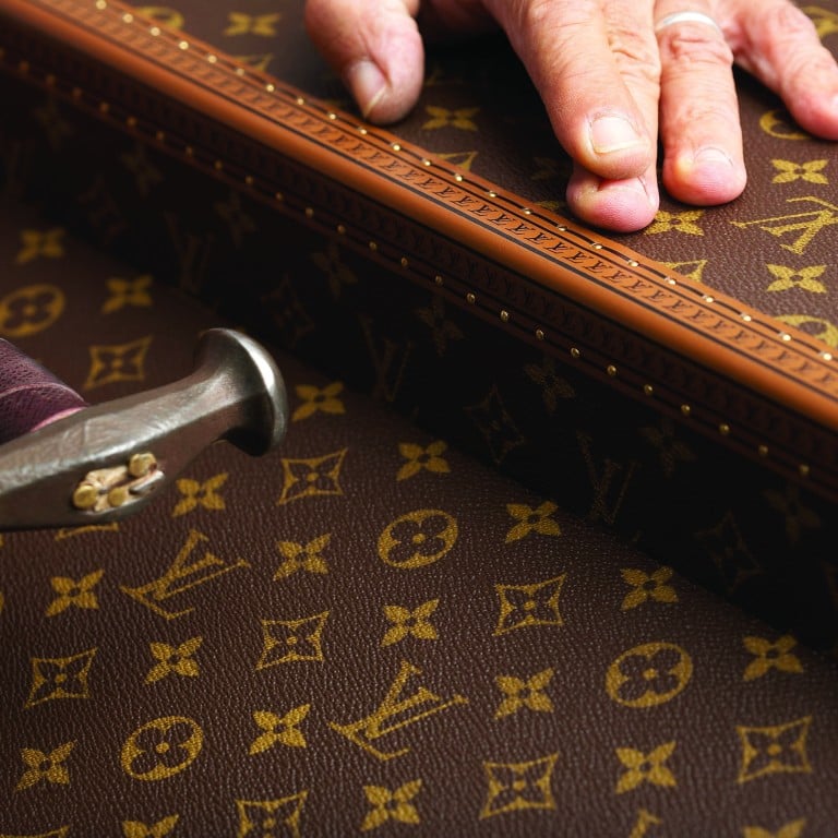 2) Louis Vuitton table-top picture frames