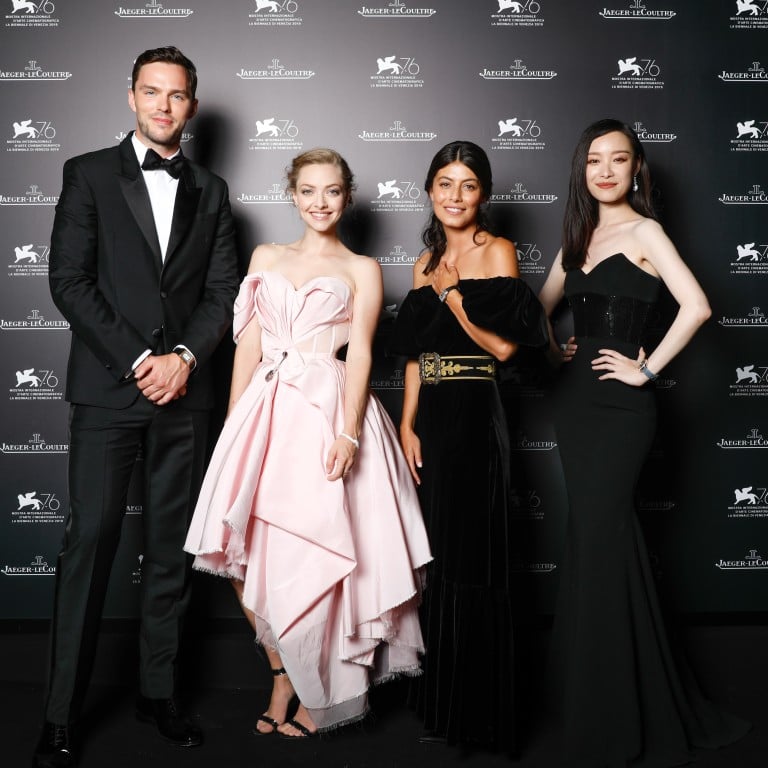 Nicholas Hoult (left), was one of the male celebrities who rocked a double-dial wristwatch at the Venice Film Festival, pictured here with Amanda Seyfried, Alessandra Mastronardi and Ni Ni. Photo: Sebastiano Pessina