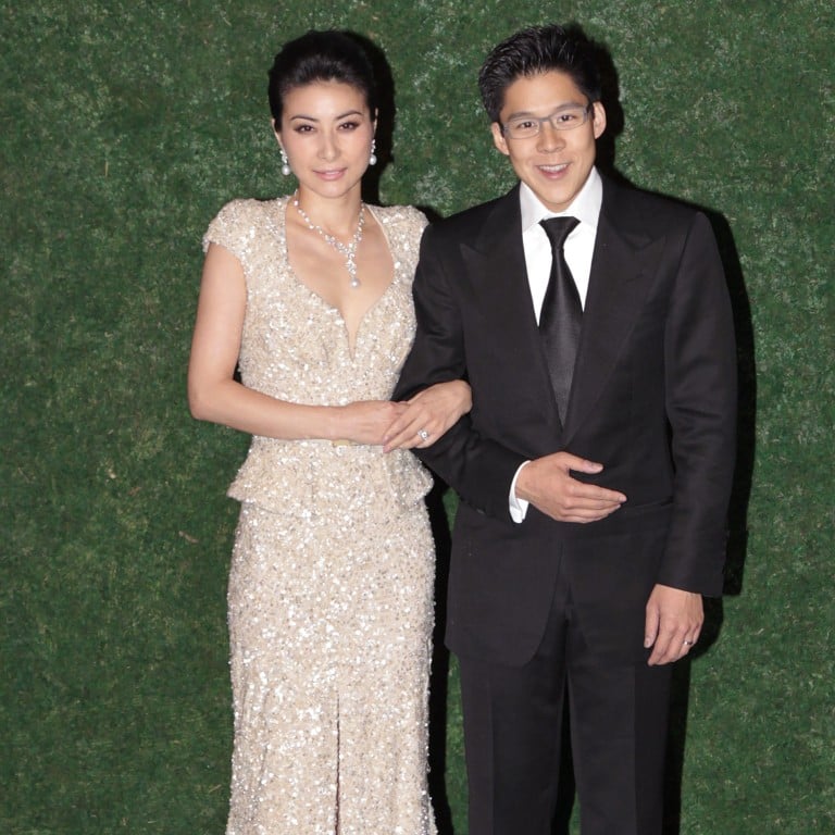 Former Chinese Olympic diving champion Guo Jingjing and her husband Kenneth Fok Kai-kong pose before their wedding banquet in Hong Kong on November 11, 2012. Photo: AP