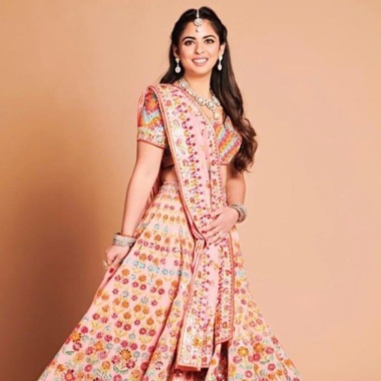 Isha Ambani wearing her wedding lehenga by designer Abu Jani Sandeep Khosla. Photo: @stylebyami/Instagram