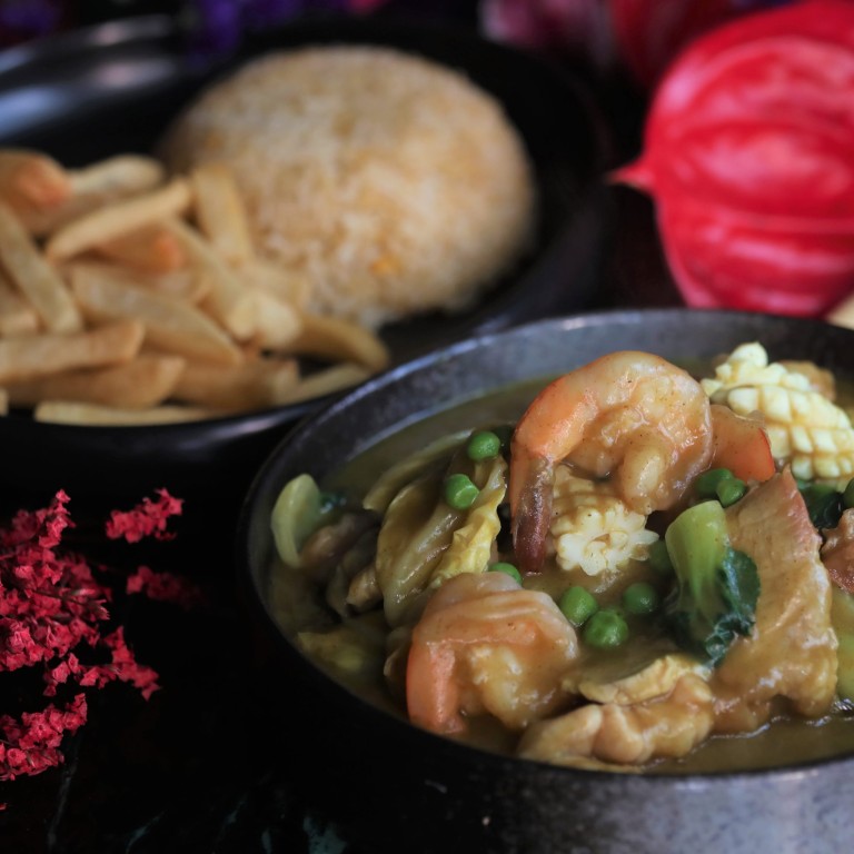 The house special at Hong Kong’s new “British Chinese” restaurant 1908BC is a curry served with both rice and chip. Photo: Jonathan Wong