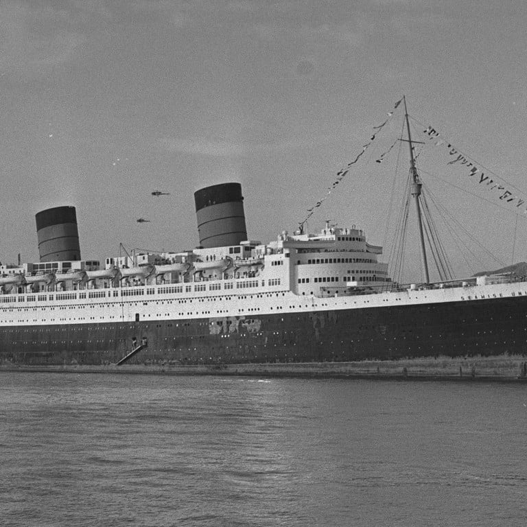 The Seawise University cruise liner, formerly known as the Queen Elizabeth cruise ship, sails across Victoria Harbour, before sinking suddenly in 1972. Photo: SCMP Archive