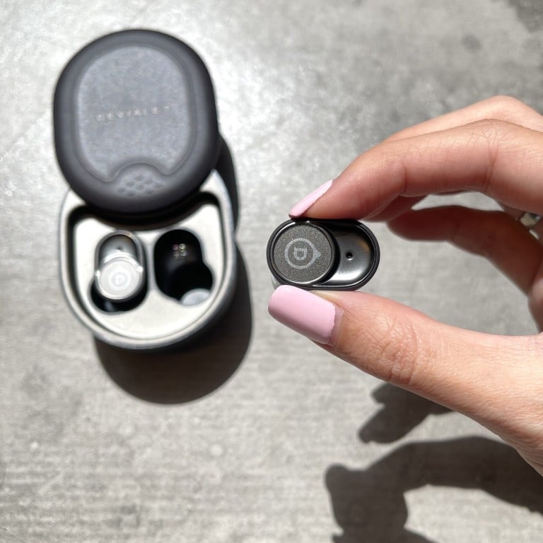 Devialet’s earbuds have a curved oval shape to them. Photo: STYLE