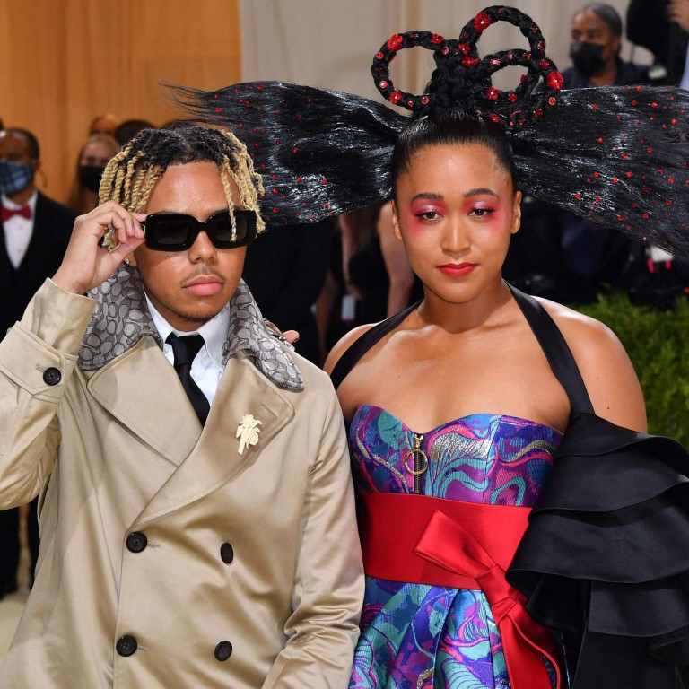Japanese tennis player Naomi Osaka and US singer Cordae arrive for the 2021 Met Gala at the Metropolitan Museum of Art on September 13 in New York. Photo: AFP