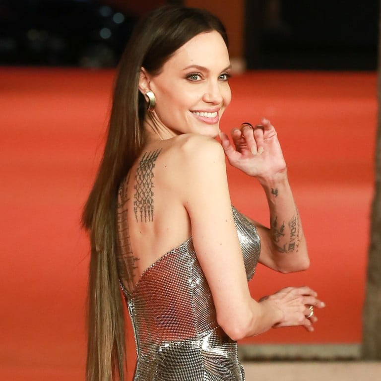 Angelina Jolie's hair extensions at the Eternals premiere go viral on the  internet for making her mane look choppy and unkempt