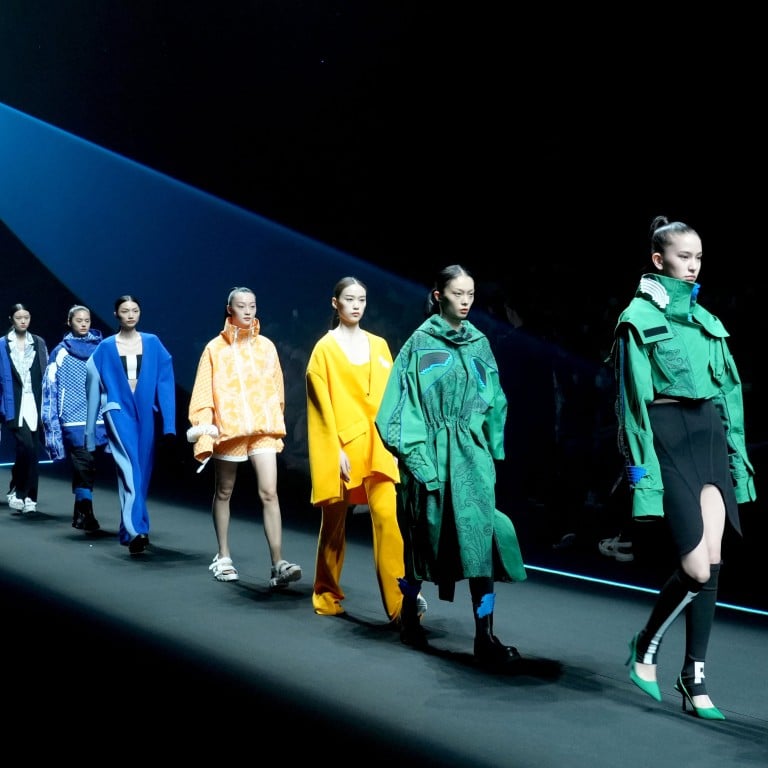 Models present creations by designer Jiang Jia during the China Fashion Week in Beijing, in September 2021. Photo: Xinhua
