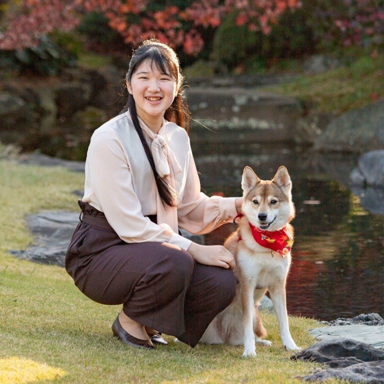 Princess Aiko with her pet dog Yuri: if the 20 year old decides to marry, she’ll be forced to leave the royal family. Photo: AFP