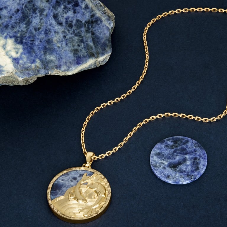 Van Cleef & Arpels Zodiaque Piscium necklace, with its sodalite background evoking the ocean depths. Photo: Van Cleef & Arpels