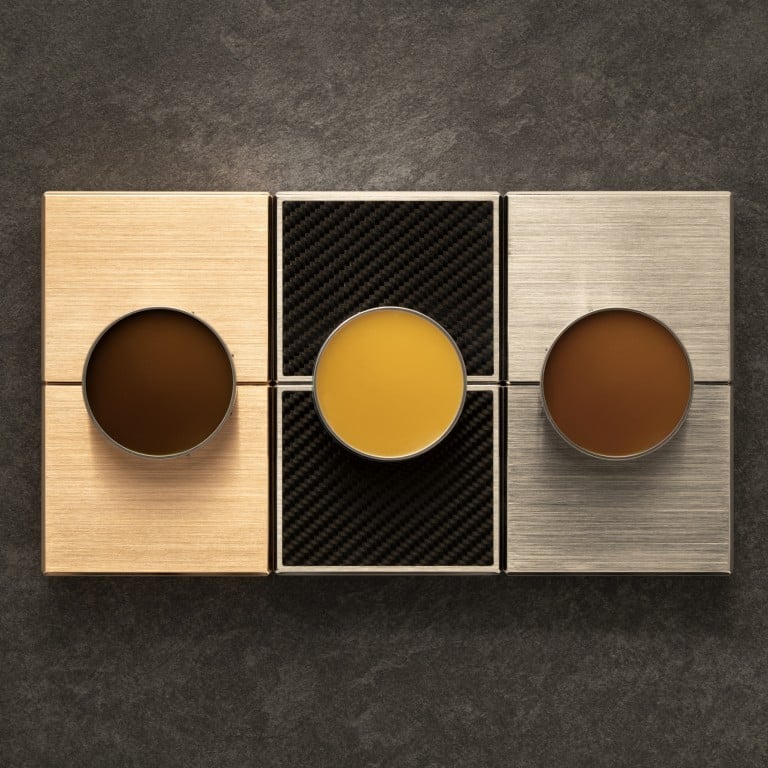 The solid perfumes sit in the stunning Clic-Clac cases dreamt up by Henry Jacques and experts from the Swiss watch industry. Photo: Henry Jacques