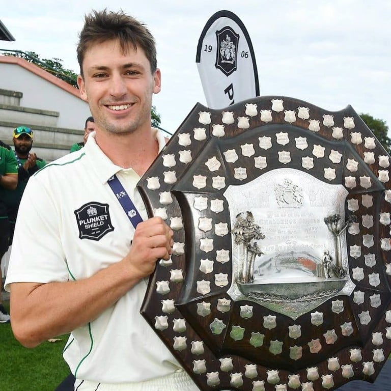 Will holding New Zealand’s Plunket Trophy after a win: the cricketer is one of the country’s top batsmen. Photo: @willyoung12/Instagram