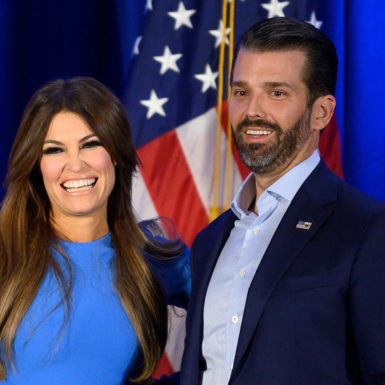 Donald Trump Jr. and his girlfriend Kimberly Guilfoyle smile during a Keep Iowa Great press conference in Des Moines, in February 2020. Photo: AFP