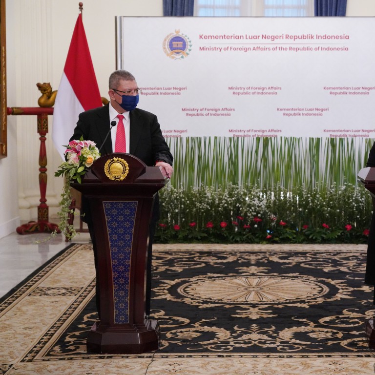 Indonesia's land and maritime border disputes with Malaysia, the