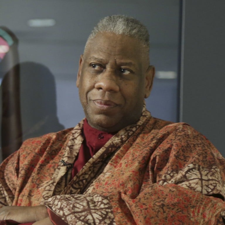 FILE - André Leon Talley, a former editor at large for Vogue magazine, speaks to a reporter at the opening of the “Black Fashion Designers” exhibit at the Fashion Institute of Technology in New York, Tuesday, Dec. 6, 2016. Talley, the towering former creative director and editor at large of Vogue magazine, has died. He was 73. Talley’s literary agent confirmed Talley’s death to USA Today late Tuesday, Jan. 18, 2022. (AP Photo/Seth Wenig, File)