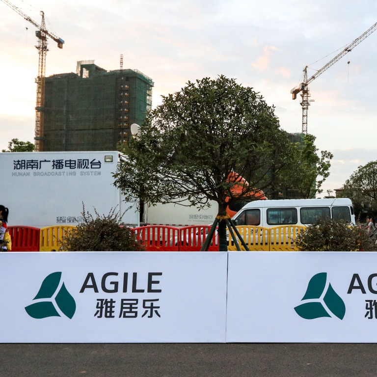 Agile said it will sell its 26.7 per cent stake in a Guangzhou property joint venture for 1.84 billion yuan (US$300 million) to a unit of China Overseas Land & Investment (Coli). Photo: Imaginechina via AFP