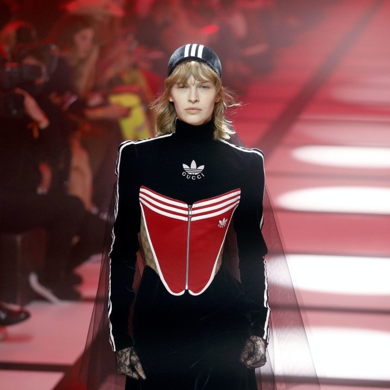 Gucci debuted its collaboration with Adidas at Milan Fashion Week. Photo: EPA