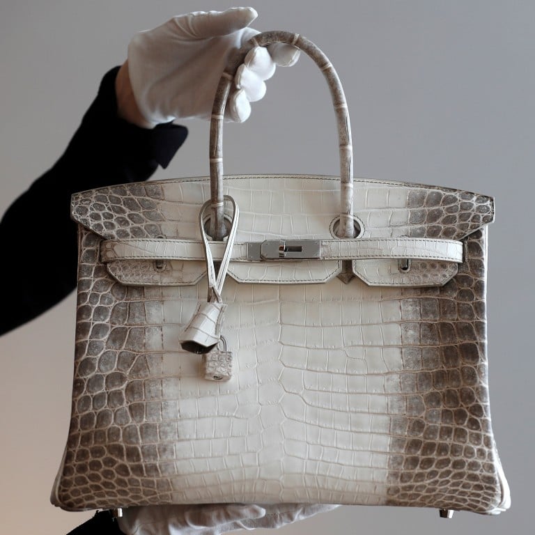 A chance meeting aboard an aeroplane led to the creation of one of the most sought-after luxury accessories, the Hermès Birkin handbag, and this matt white Birkin Himalaya 35 is a still-rarer edition. Photo: Reuters