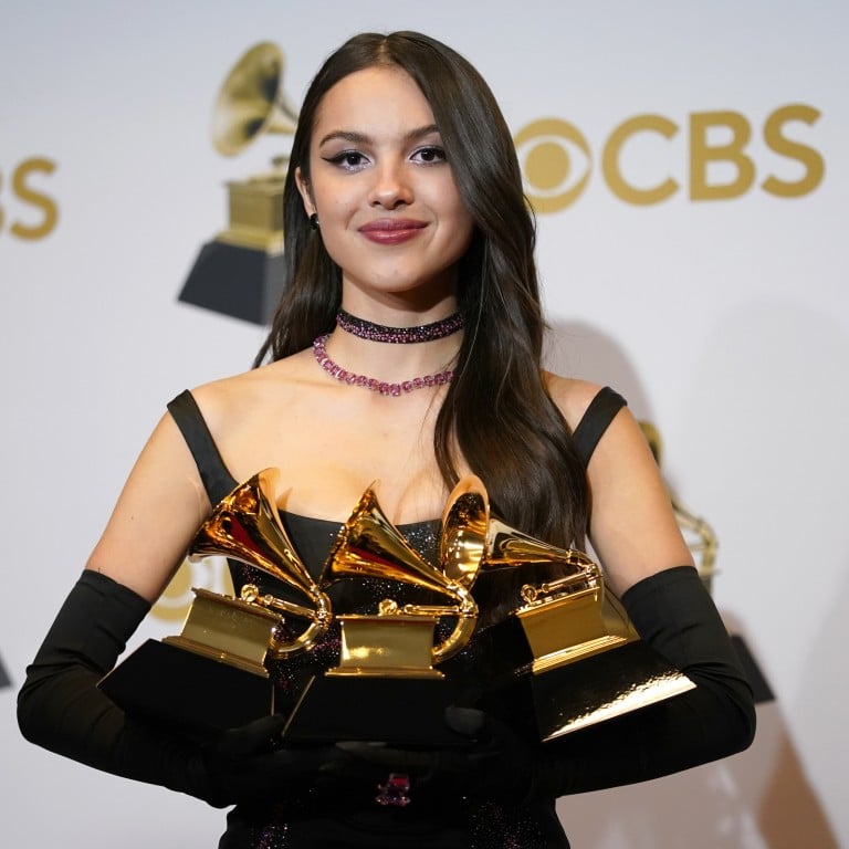Olivia Rodrigo, winner of the awards for best pop vocal album for “Sour,” best new artist and best pop solo performance for drivers license, poses in the press room at the 64th Annual Grammy Awards at the MGM Grand Garden Arena on April 3, in Las Vegas. Photo: AP Photo