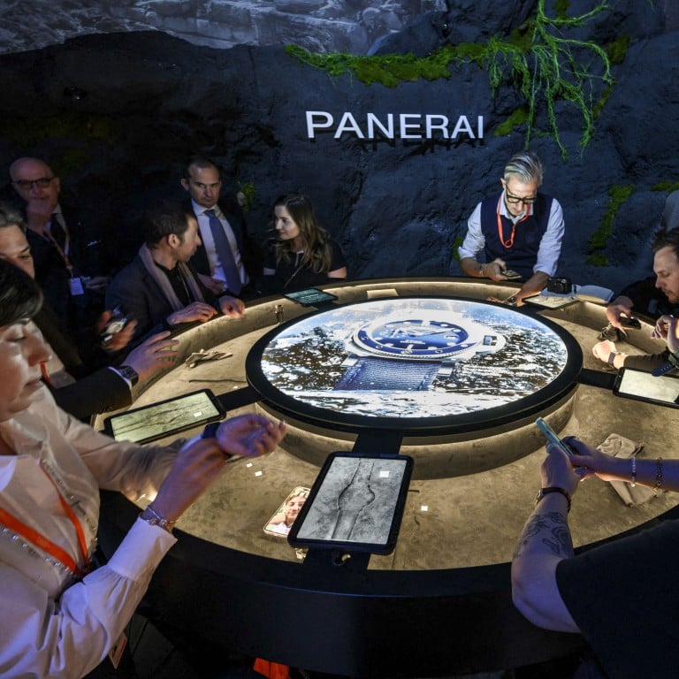 In a sign of the robust health of the sector, the booths of many luxury watch manufacturers – including that of Panerai, owned by Richemont group – were busy on the opening day of the Watches and Wonders Geneva show, in Geneva on March 30, 2022. Photo: AFP