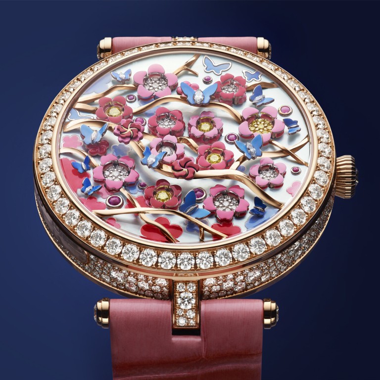 Heures Florales Cerisier by Van Cleef & Arpels shows the hours by the number of open flowers. Photo: Van Cleef & Arpels