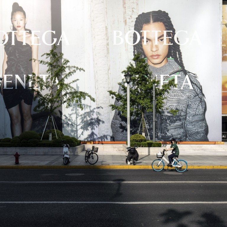 A shopping center along a near-empty street under lockdown due to Covid-19 in Shanghai on May 5, 2022. Photo: Bloomberg