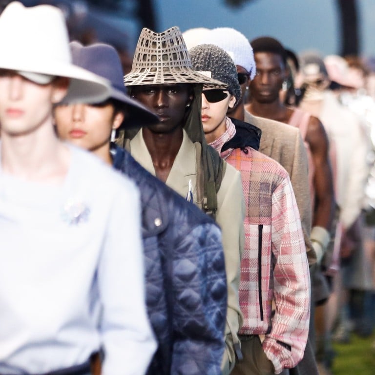 Models present creations from the spring/summer 2023 men’s collection by designer Kim Jones for Dior Homme during Paris Fashion Week, in Paris, France, on June 24. Photo: EPA-EFE
