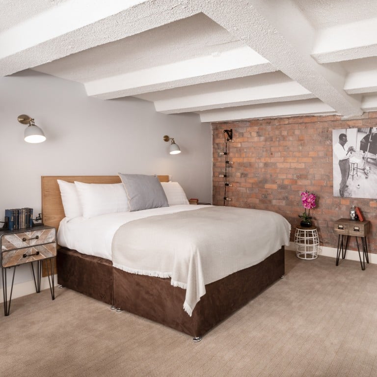 A home in the converted Tobacco Warehouse in Liverpool’s docks area, one of the up-and-coming areas in the UK as the pandemic-era trend for rural housing eases. Photo: Tobacco Warehouse