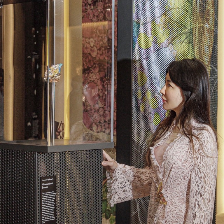 Anna Hu, jewellery artist and founder of her eponymous brand, with her latest masterpiece, the Metamorphosis Bracelet, at TEFAF Maastricht 2022. Photos: Anna Hu