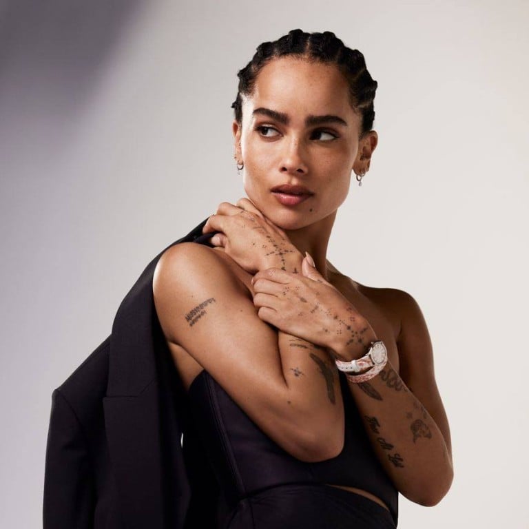 Zoë Kravitz wears a 28mm stainless steel version of the Constellation during the campaign filming. Photos: Omega