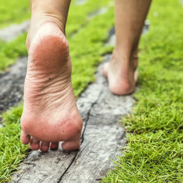 Did you know there's health benefits to walking barefoot in the grass?