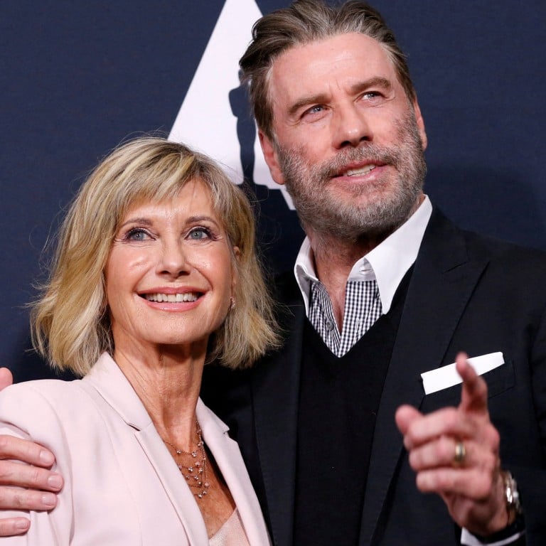 More than 40 years after finding fame together with Grease, Olivia Newton-John and John Travolta remained hopelessly devoted to each other. Photo: Reuters