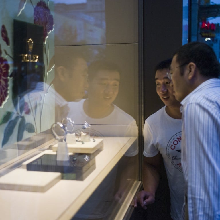 Cash is king in an unstable economy, and wealthier Chinese are selling their pre-owned luxury goods, such as Rolex watches, to make a quick buck. Photo: AFP