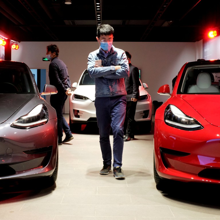 The Tesla effect? Electric cars might still be the reserve of the elite – but that’s exactly why affluent new property developments need to be ready for them. Photo: Reuters