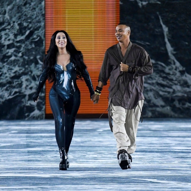 US singer Cher walks next to French fashion designer Olivier Rousteing as she presents a creation for the Balmain spring/summer 2023 fashion show during the Paris Womenswear Fashion Week, in Paris, on September 28. Photo: AFP