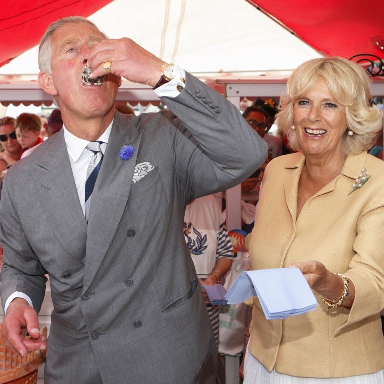 King Charles, pictured with Camilla, Queen Consort at the Whitstable Oyster Festival in July 2013, in Whitstable, England, appears to enjoy his oysters, but what else do you know about his eating habits? Photo: Indigo/Getty Images