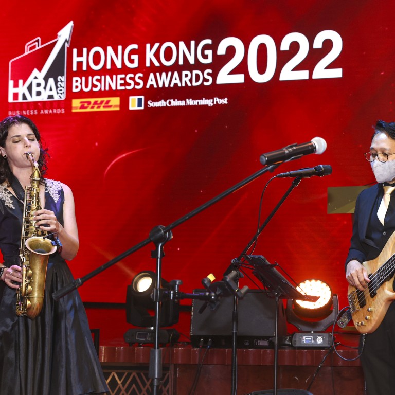 HSBC’s taipan Peter Wong feted for 4-decade banking achievement at DHL ...