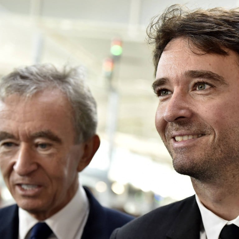 LVMH’s CEO Bernard Arnault (left) just elevated his son Antoine to a bigger role, prompting discussion about succession plans. Photo: AFP