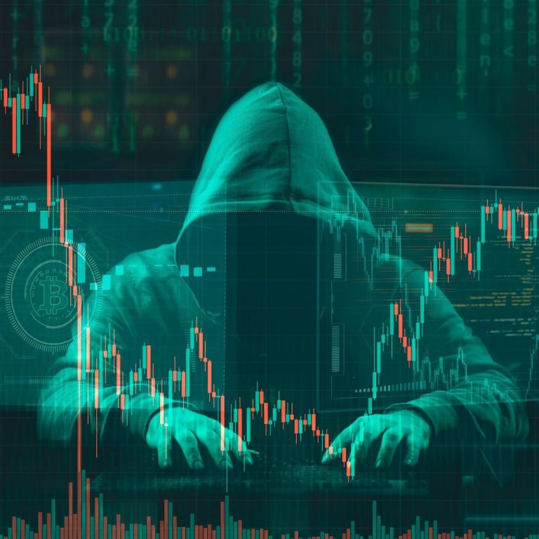 hooded hacker stealing or scamming crypto currency Shutterstock ID: 2175912727 Photo: Shutterstock