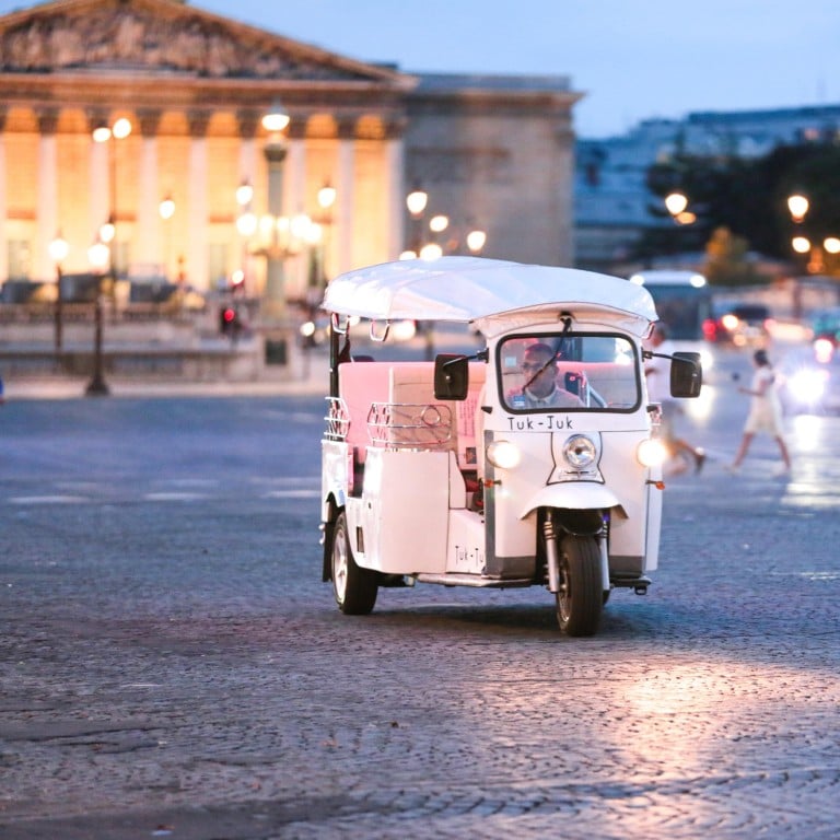 A tuk-tuk is seen on Place de la Concorde in Paris, France. Photo: Getty Images
