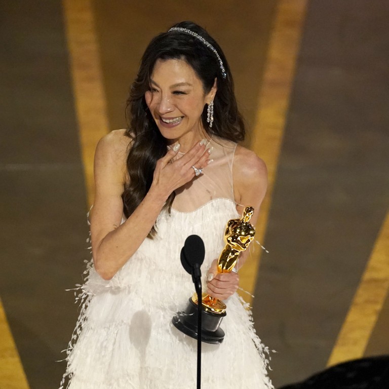 Michelle Yeoh accepts the award for best performance by an actress in a leading role for Everything Everywhere All at Once at the Oscars on March 12, at the Dolby Theatre in Los Angeles. Photo: AP