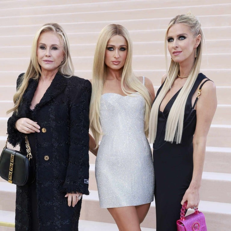 Kathy, Paris and Nicky Hilton have seen their family’s wealth and success increase drastically over the years. Photo: Getty Images
