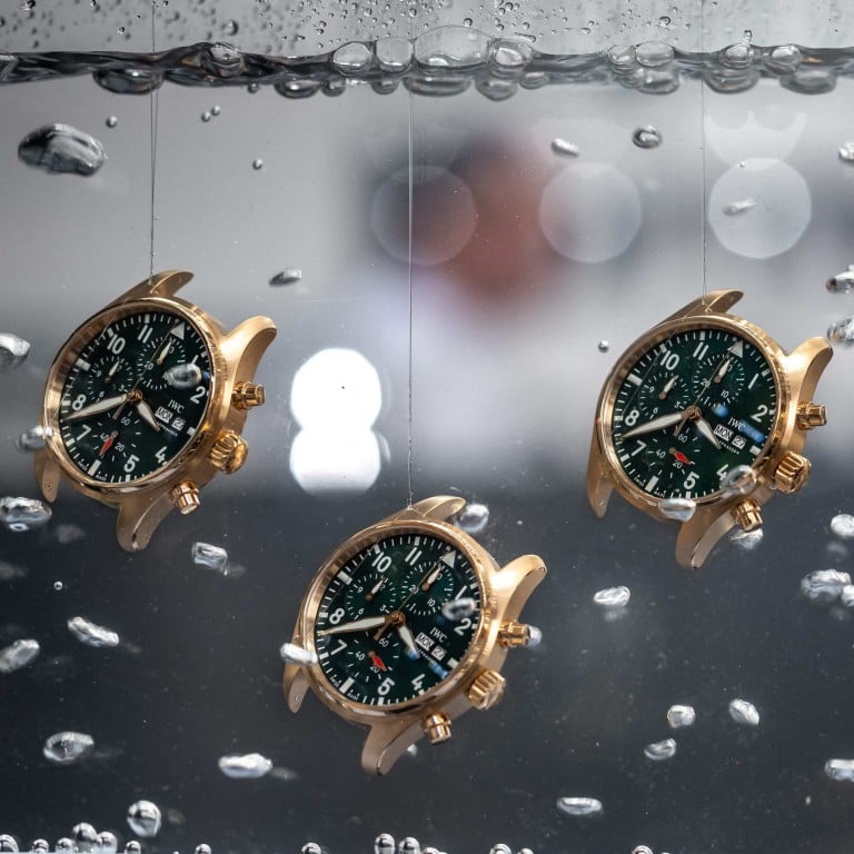 Watches are seen in water at the booth of Swiss watch manufacturer IWC on the opening day of the luxury watch fair Watches and Wonders, on March 27, in Geneva. Photo: AFP