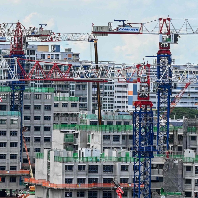 Singapore unveils surprise measures to cool property market, doubles
